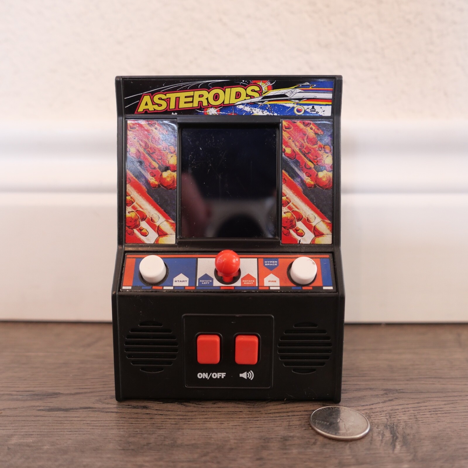 asteroids arcade game. made By Basic Fun
