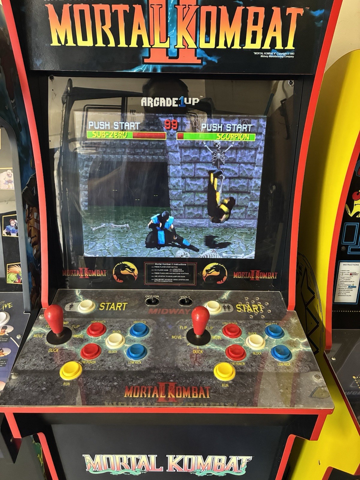 Arcade1Up Mortal Kombat Game Machine with riser