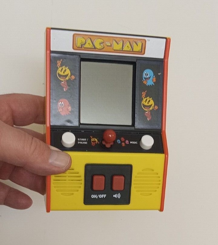 Mini Pac-man Handheld Arcade Game Pacman Bandai Namco. Works. batteries included