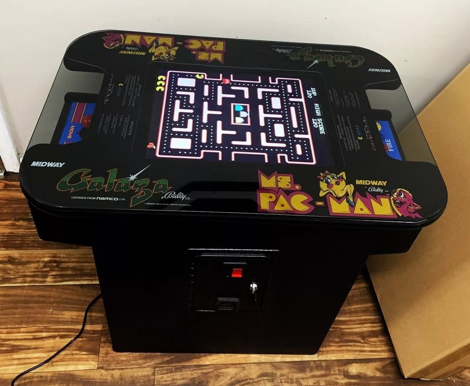 Arcade Games Cocktail Tables Ms. Pacman arcade game free play or coin operated