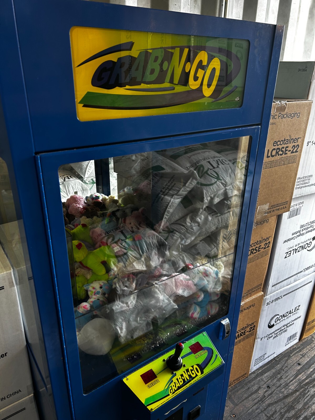 Grab-N-Go claw machine arcade game (Blue & Yellow, takes quarters)
