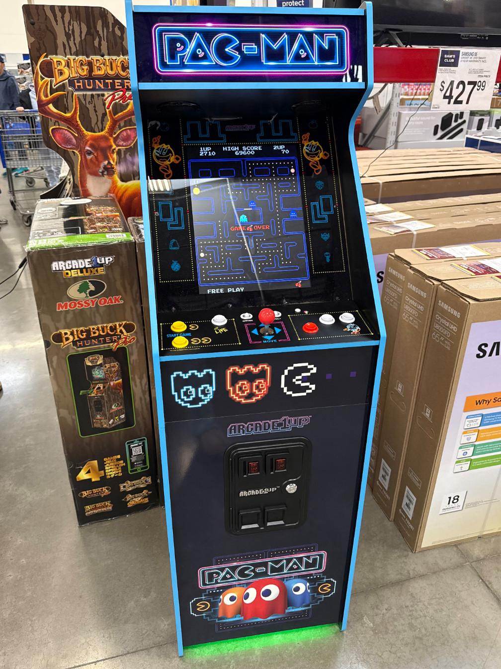 ARCADE1UP PAC-MAN DELUXE ARCADE MACHINE WITH 14 GAMES INCLUDED, 5 FEET TALL,NEON