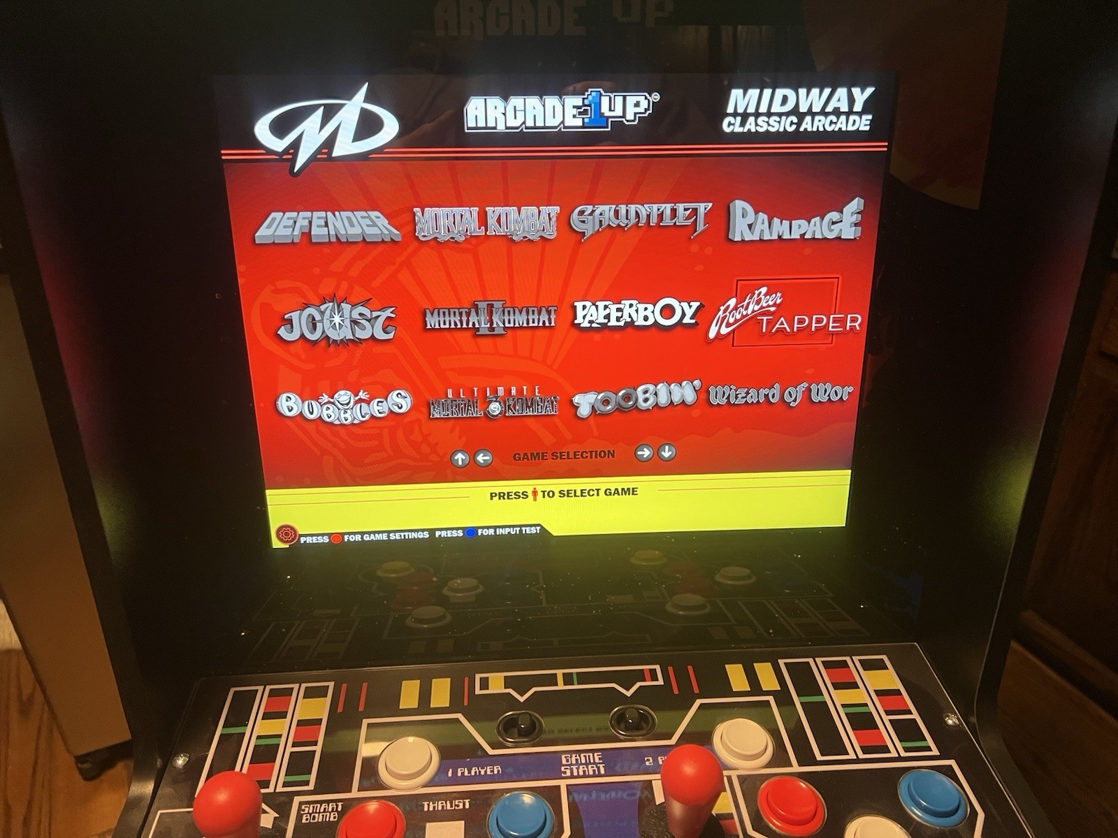Arcade1Up 40th Anniversary Midway Defender Arcade game with riser